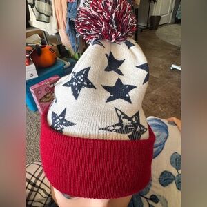 OS red white and blue patriotic beanie with ball. Like new condition.